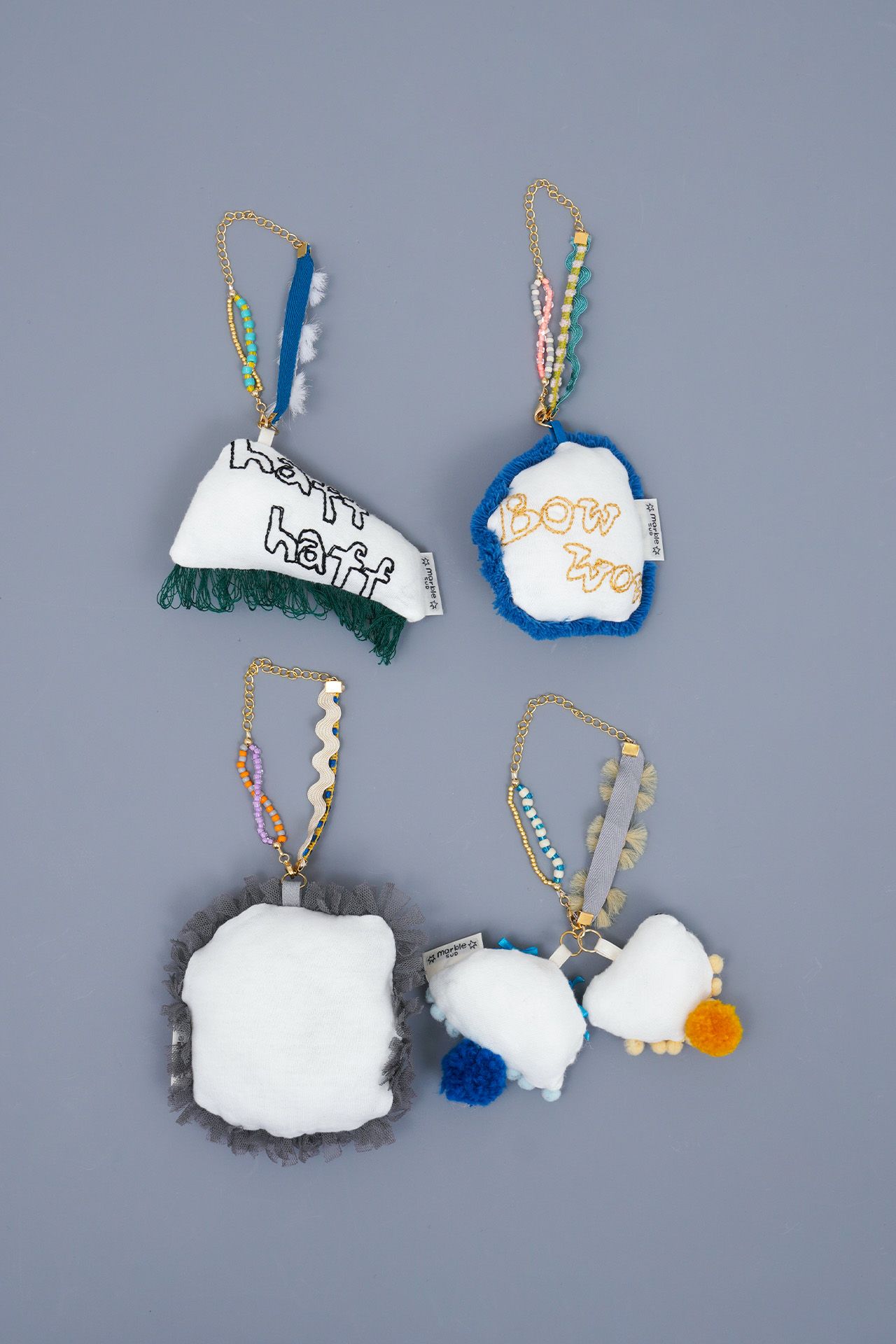 春新作の EMB rakugaki dog BAGチャーム | marble SUD(マーブルシュッド トップス
