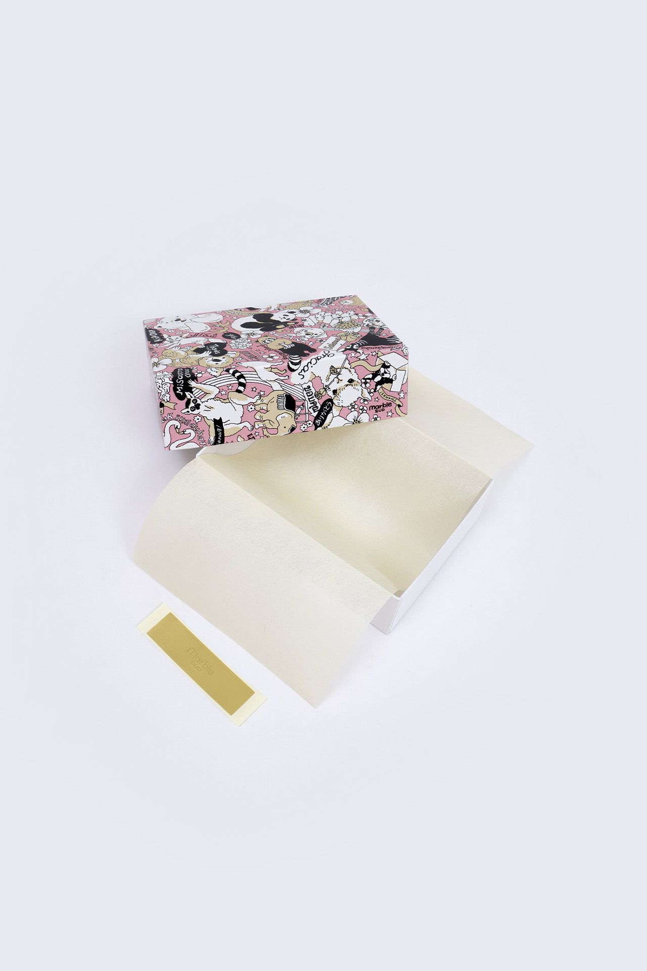 薄紙とギフト用のシールが付いてきます